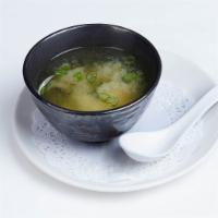 Miso Soup · Soybean broth with soft tofu, dried seaweed, scallions and shiitake mushrooms.