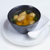 Tasty Mini Wonton Soup · Homemade mini pork wontons in clear chicken broth.