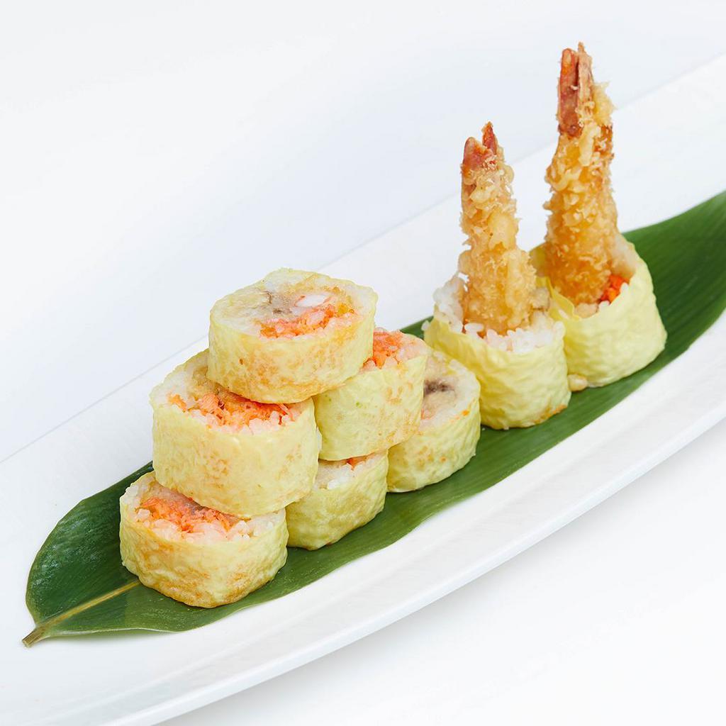 Paradise Roll · Inside: fried banana, spicy snow crab, shrimp tempura with soy bean paper, served with mango chili sauce.
