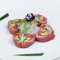 Sweet Heart Roll · Inside: spicy salmon, kani, seaweed salad and avocado. Outside: wrapped with tuna. Spicy.
