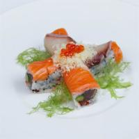 Long Island Roll · Inside: pepper tuna, asparagus, tobiko. Outside: salmon, yellowtail, ikura, served with wasa...
