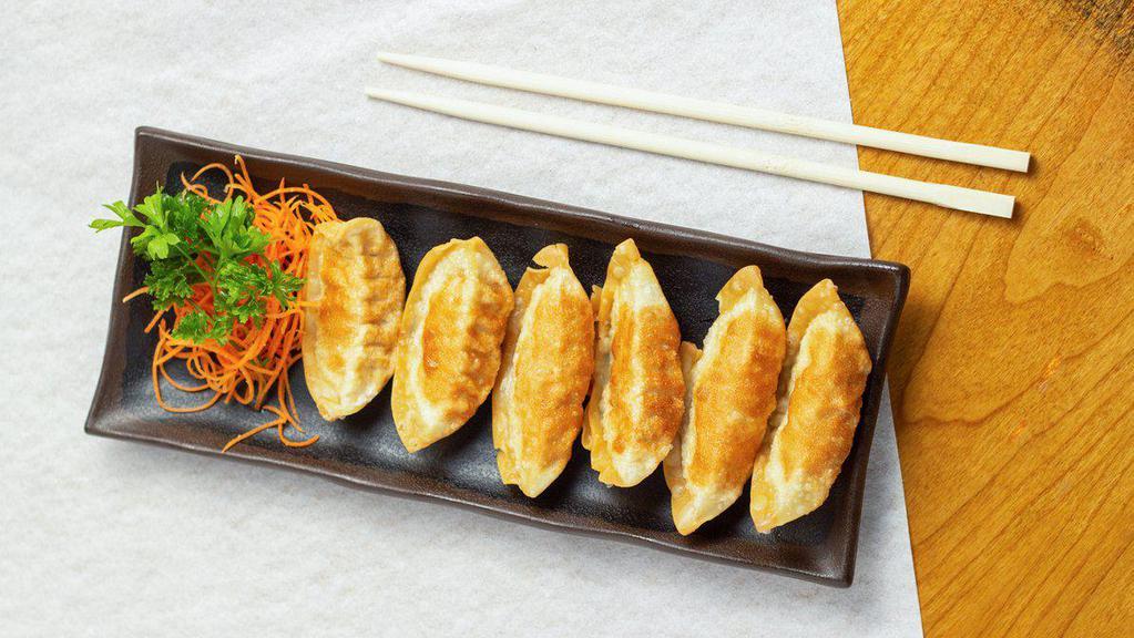 6 Piece Gyoza · Pork and vegetable dumplings, served steamed or deep fried.