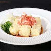Agendashi Tofu · Fried tofu with sweet dash tempura sauce and non balsamic dressing.