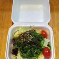 Seaweed Salad · Marinated seaweed with sesame seeds and balsamic sauce.