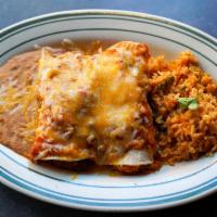  Chicken Enchiladas · Shredoed seasoned chicken topped with ranchera sauce and melted Jack cheese.