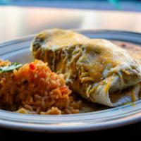 Grilled Chicken Burrito · Burrito filled with grilled chocken, rice and beans. Grilled pepper and onions topped with r...