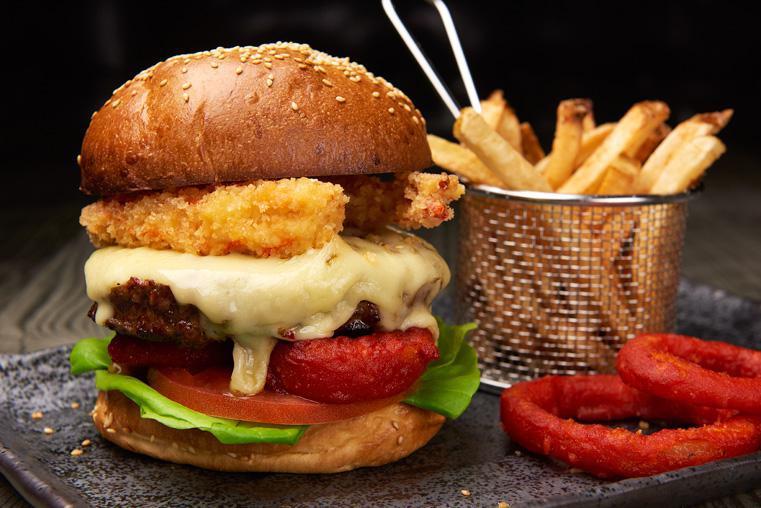 Pirate Burger · Prime beef burger, tomatoes, lettuce, bun, spicy onion rings, shrimps, pepper jack cheese, beer mustard sauce