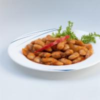 Gigandes · Oven-baked Lima beans enhanced w/ tomatoes, garlic, parsley, & onions.