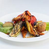 Loukoumi Grilled Vegetables. · A medley of grilled vegetables, consisting of carrots, zucchinis, eggplants, tomatoes, onion...