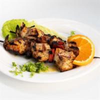 Chicken Souvlaki · Grilled chicken kebab w/ dried dates, topped w/ Greek seasonings