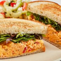 Spicy Pimento Cheese Sandwich · With mixed lettuce on toasted wheat bread. 

