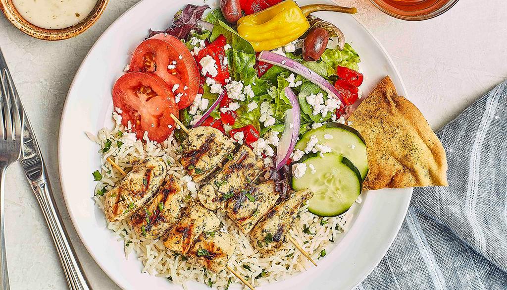 Grilled Chicken Kebob Feast  · Two kebobs served with Tazikis Sauce