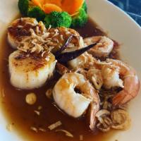 Shrimp and Scallop · Seared Shrimp and Scallop in our special sauce topped with Fried onions served with steamed ...