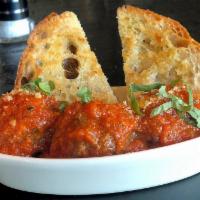 Meatballs Florentina* · FIGO meatballs with spicy tomato sauce and ciabatta bread.