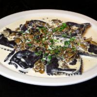 Funghi* · Selection of wild mushrooms with cream and a touch of garlic.