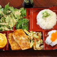 Salmon Teriyaki Bento Box · Served with green salad, seaweed salad, steamed rice, 4pc cal roll, 1pc egg roll and 1pc gyo...