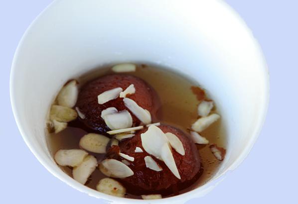 Gulab Jamun · A light pastry dumpling made with fresh milk and sweet honey (served warm).