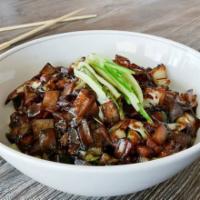BK Jjajang Myeon · Black bean sauce with stir fried pork and vegetables over noodles or rice.