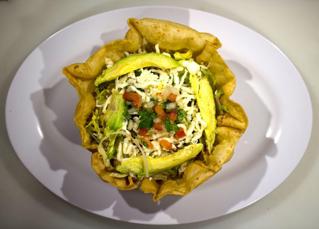 Taco Salad · Our Burrito Bowl consist of : A 8