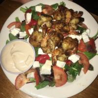 Baby Greens Salad · Mixed greens lettuce with tomato, fresh mozzarella and roasted peppers with our house balsam...
