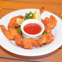 Coconut Fried Shrimp  · Encrusted with panko and shredded coconut, served with a sweet Thai chili sauce.