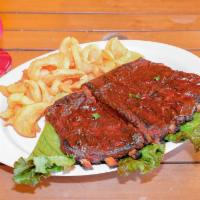 Grilled Pork Ribs · Glazed with habanero BBQ sauce, served with fries.