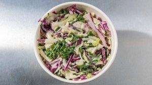 Kale Slaw · Dave's creamy special dressing mixed with shredded veggies.
