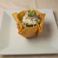 Tacos Salad · Served on fried flour tortilla with lettuce, vegetables, chicken, guacamole, sour cream, pic...