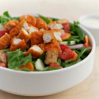 Buffalo Chicken Salad · Grilled or fried chicken tossed in Buffalo medium sauce, assorted greens, shredded carrots, ...