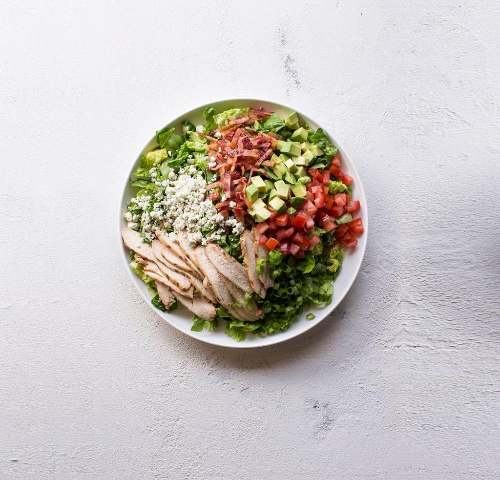 Chopped Salad · Romaine blend, grilled chicken, bacon, bleu cheese, avocado, tomato, green onion, and house vinaigrette.