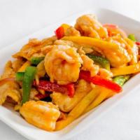 Mango Chicken with Jumbo Shrimp · Sliced chicken breast stir fried with diced mango, peppers, red onion, and jumbo shrimp.