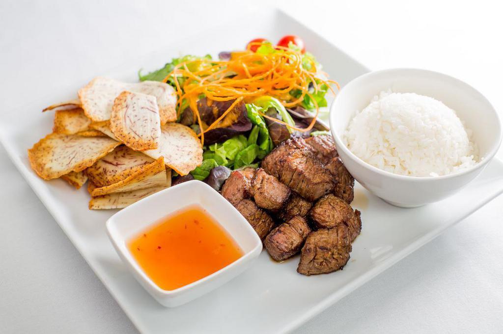 Steak Cubes · Choice cuts of marinated steak served with taro chips.