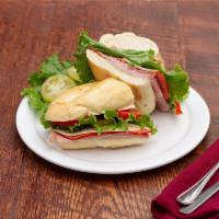 Italian Cold Cut Sandwich · Cappicola ham, salami, peppered ham, Swiss, oil and vinegar, lettuce, tomato on a French roll.