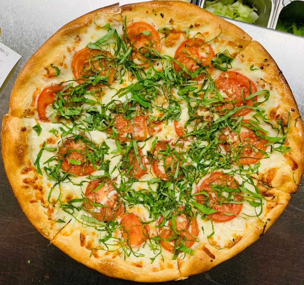 Margherita Pizza · Fresh tomato, garlic, mozzarella, Parmesan, basil.