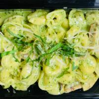 Tortellini Pesto  · Cheese filled tortellini, creamy pesto, basil, fresh Parmigiano 