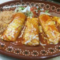 Enchiladas Rojas · Beef enchiladas topped with red sauce.