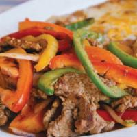 Steak Fajita · Marinated sirloin tips, grilled with bell pepper, onion, and tomato. Served with rice, beans...