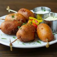 CORN DOG DIPPERS · All beef franks, honey cornmeal batter, mustard, chipotle aioli.