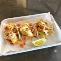 FISH TACOS · Three tacos, pineapple pico, cabbage, poblano crema, cilantro