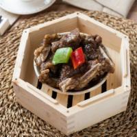 Beef Short Rib 黑椒牛仔骨 · Served with black pepper sauce.