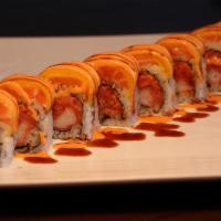 S11. Dancing Roll · Kani tempura, spicy tuna inside, salmon, mango, spicy mayo, eel sauce on top