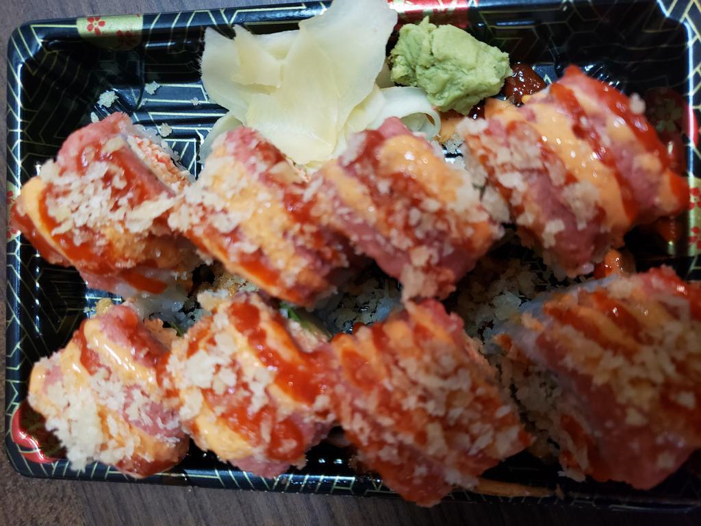 S27. Fire Fighter Roll · Spicy crab, avocado, spicy tuna, crunch, spicy mayo, siracha