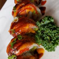 S16. Crazy shrimp roll · Shrimp tempura, Kani and avocado inside with spicy tuna on top with seared eel sauce, spicy ...
