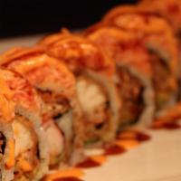 S18. Super Spider Roll · Deep fried soft shell crab, avocado, crab inside, spicy tuna, spicy crab on top.