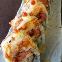 S25. Diana Roll · Shrimp tempura,  avocado,  spicy tuna, asparagus inside, lobster salad,  wasabi mayo, eel sa...