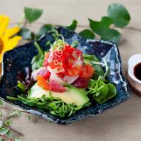Sashimi Salad · Tuna, salmon, yellowtail, avocado and mixed baby green and lettuce