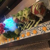 Tuna Amazing Roll · White tuna, spicy tuna and cucumber inside, topped with black pepper tuna, tuna, avocado and...