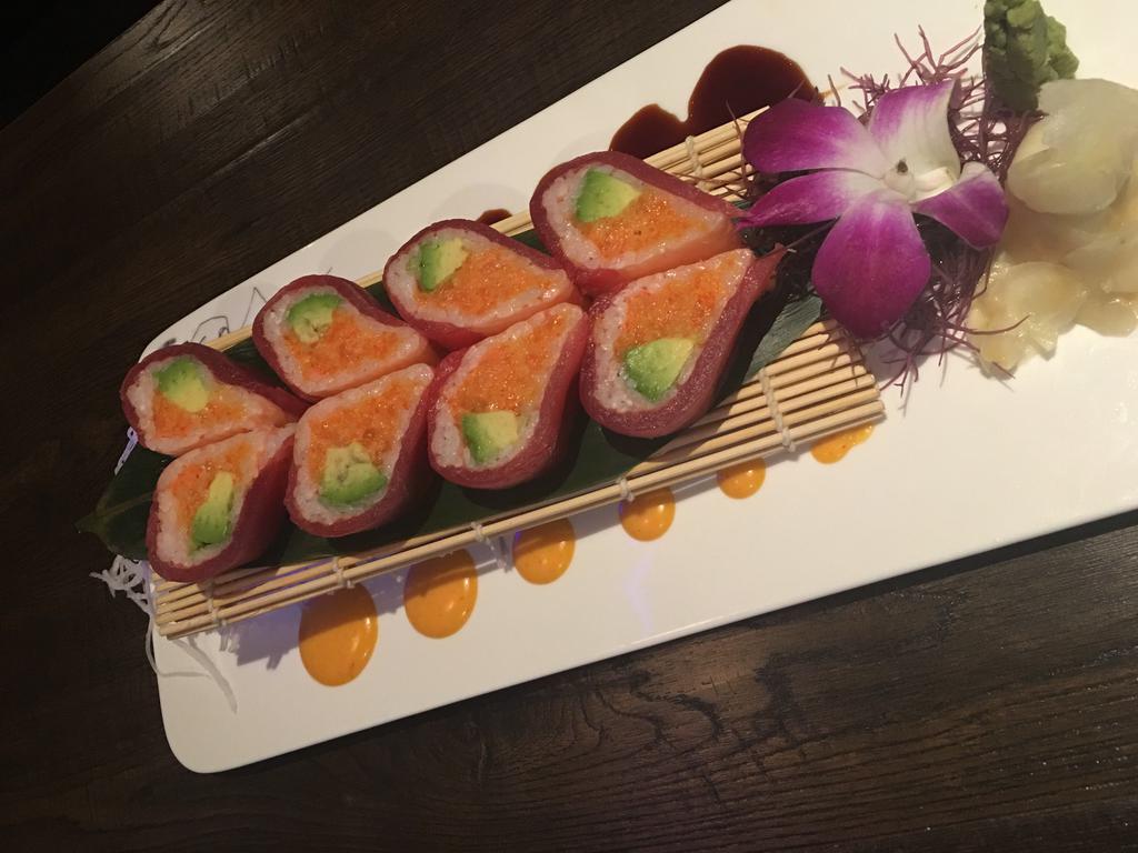 Sweet Heart Roll · Spicy crunchy salmon, avocado inside, tuna, outside with heart style.