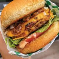 Beleaf Double Cheese Burger · Two House seasoned Beyond Meat patties, caramelized onion, fresh diced onion, house spread a...