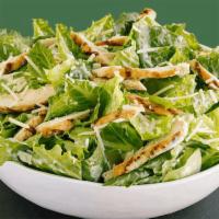 Chicken Caesar Salad · Romaine lettuce, grilled chicken, Parmesan cheese, and croutons. Add cheese for an additiona...